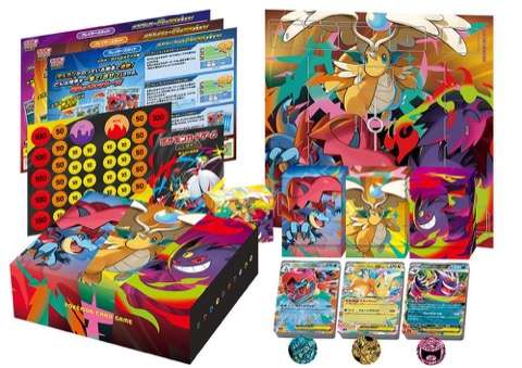 Official photo of the Special Deck Set MEGA contents: three deck boxes, playmat, damage counter sheet, coins, player's guides and card box